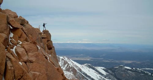 Hikers on Top of Rocky Mountains, Wide Landscape View From Peak Adventure