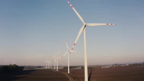 Aerial View Wind Farm or Wind Farm with Tall Wind Turbines for Generating
