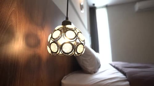 unique lighting accessories in the bedroom in a modern minimalist home
