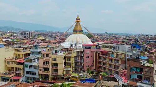 Flying Towards The Bouddha Stupa Buddhist Temple In Kathmandu, Nepal. Aerial Drone Shot