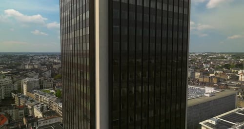 A Black Skyscraper Against a Blue Sky Was Filmed From a Drone in the City of Nantes The Only