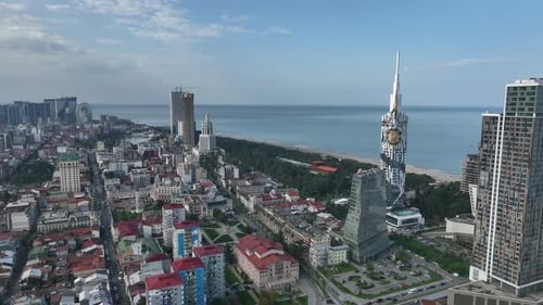 Aerial view of Batumi university and Alphabetic tower, skyscrapers and embankment of Batumi city