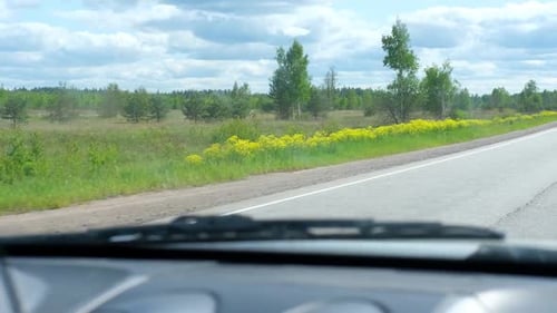 Car in Motion Front View From Car Passenger Window Pov Panorama Auto Speeding on a Road Highway
