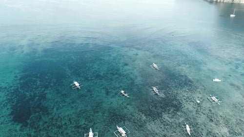 Aerial Drone View of Boats Anchored in the Bay with Clear and Turquoise Water Boat and Yacht in the