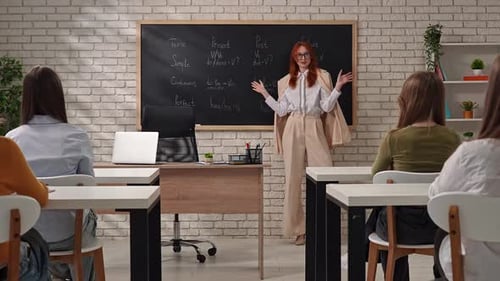 Teacher Explaining Grammar in a Classroom Setting