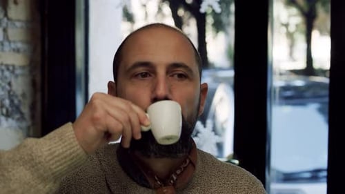 Medium on Red Camera. in a Small Coffee Shop, A