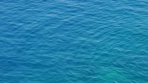 Abstract gentle sea waves background. Beautiful beach ,Aerial drone footage
