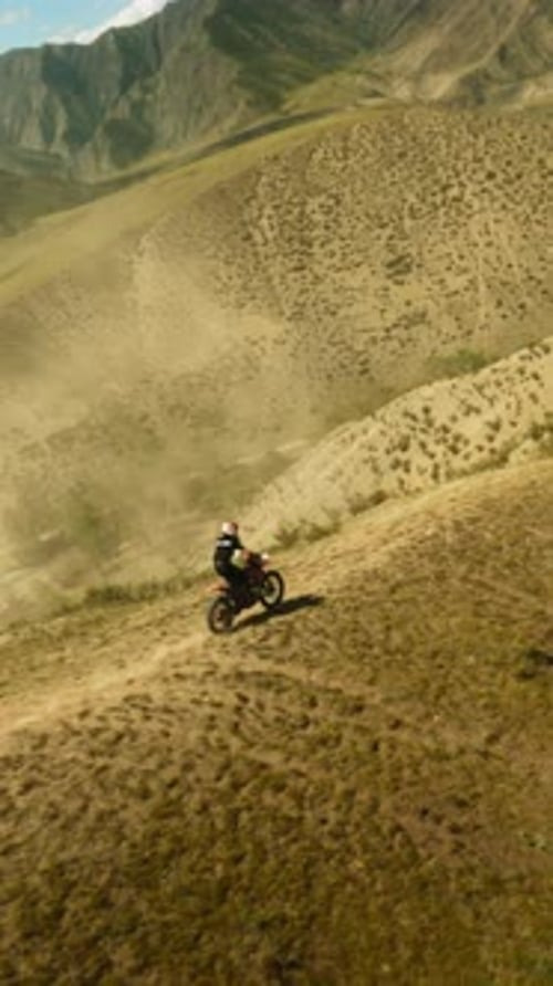 Extreme Lover Rides Motorbike Along Hill Ridge Fpv Drone