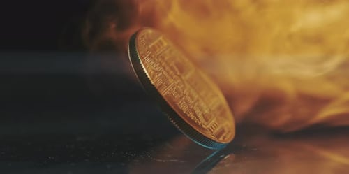 Golden Bitcoin Spinning with Flames