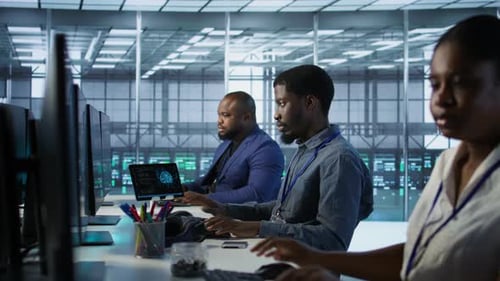 System Administrators in Data Center Implementing AI Predictive Systems