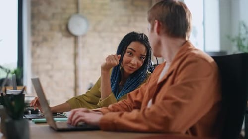 Creative Startupers Discussing Project Working at Laptops in Office Close Up