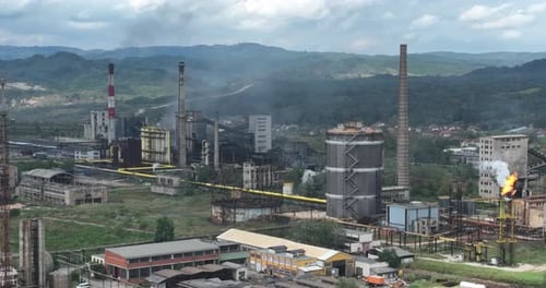 Burning a Torch at a Chemical Plant Emission of Harmful Substances Into the Atmosphere Chimney With
