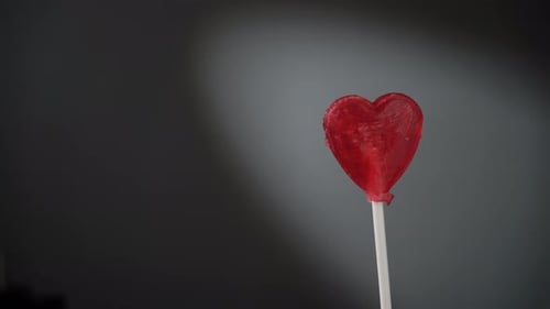 Heart Shaped Lollipop Spinning on a Stick