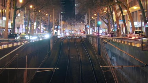 Symmetrical Trams and Traffic Timelapse at Train Station