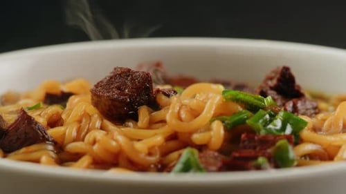 Delicious Bowl of Noodles with Savory Meat