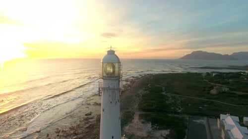 4K aerial drone footage of a lighthouse at dusk