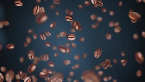 Roasted Coffee Beans Falling Against Dark Background