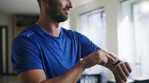 Cheerful Sportsman Checking Smartwatch in Fitness Club Closeup Smiling Man