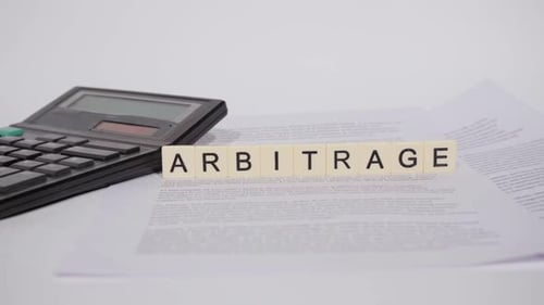 Calculator and Arbitrage Scrabble Tiles on Document