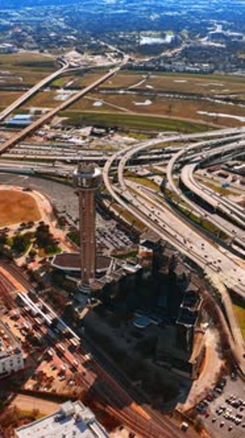 Multiple highways intertwining and crossing in the scenery of Dallas, Texas, USA.