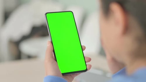 Close Up of Woman using Smartphone with Chroma Key Screen