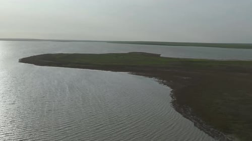 Water Surface With a Small Wave Waves on the Pond Surface Waves in Shallow Water Aerial View Flying