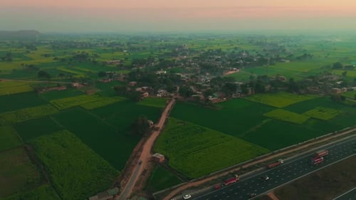 Aerial view of highway and fields, India.