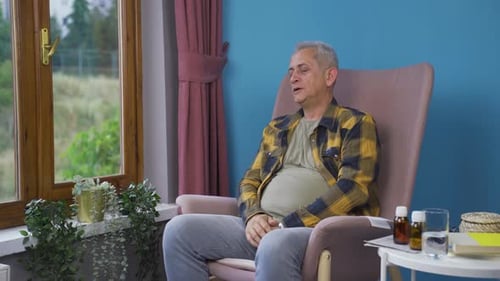 Man with Cold Resting at Home