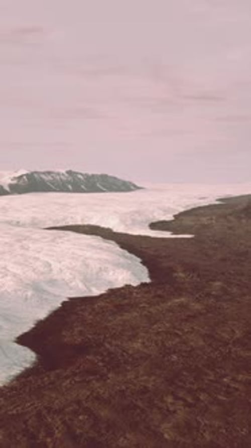 A Breathtaking Glacier Surrounded By Majestic Mountains