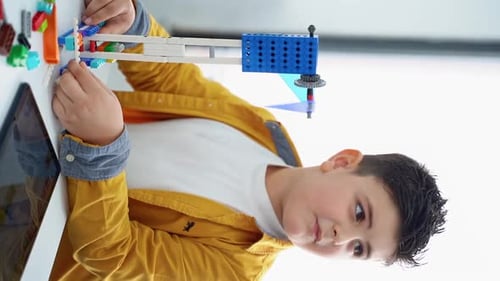 Robotics Programming Class Children Construct and Code Robot STEM Education Using Constructor