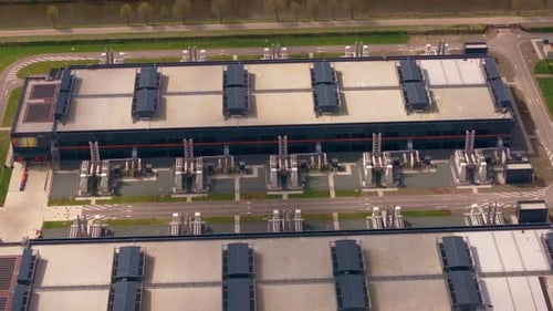 High-tech facility with data halls surrounded by flat fields