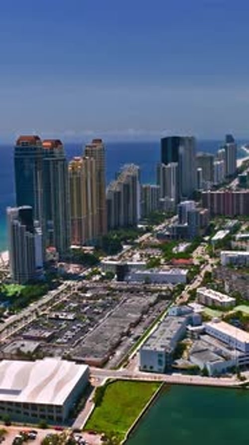 Vertical aerial view of Miami showcasing urban and coastal landscapes