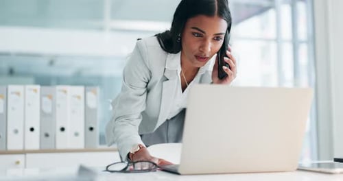 Phone call, laptop and business Indian woman in office for planning, discussion and communication
