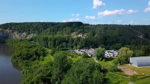 Aerial view of wild nature with rock clif and endless forest