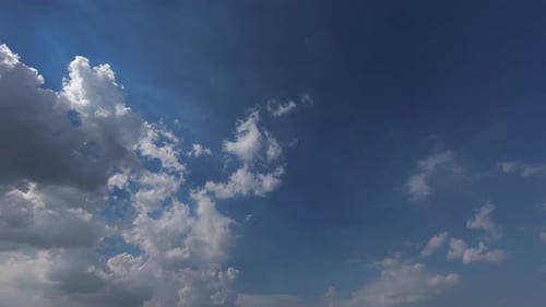 Blue Sky Time Lapse with Fluffy White Clouds