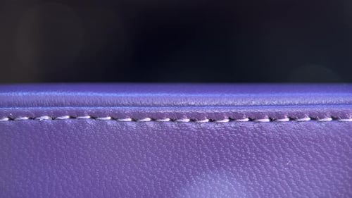 Macro View of Violet Leather Stitching Details
