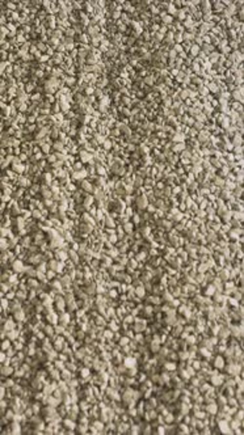 Close Up of Conveyor Belt with Gravel Stock Footage Many Small Crushed Stones on the Production Line