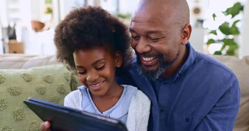 Father, daughter and tablet or laugh on sofa for game, streaming or elearning in living room