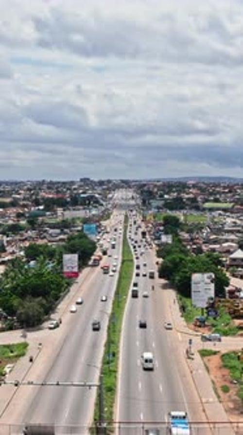 Drone Shot of Moving Traffic on a Highway In Accra
