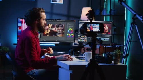 Man Creating Video Content at Home Office