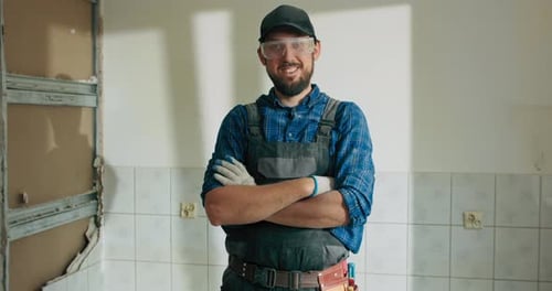 Smiling Construction Worker With Safety Glasses