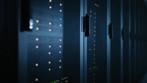 Moving Walkthrough Shot of Dark Modern Data Center With Row of Fully Operational Server Racks. Mode