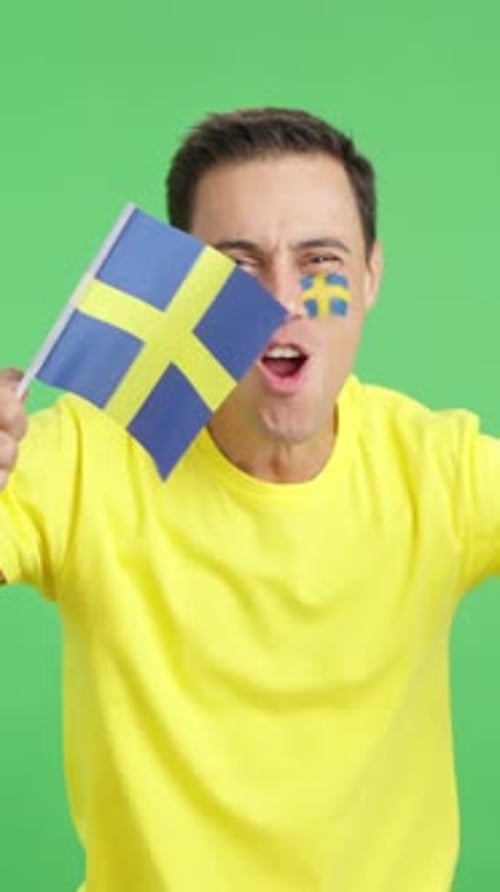 Excited Fan Waving Flag on Green Screen