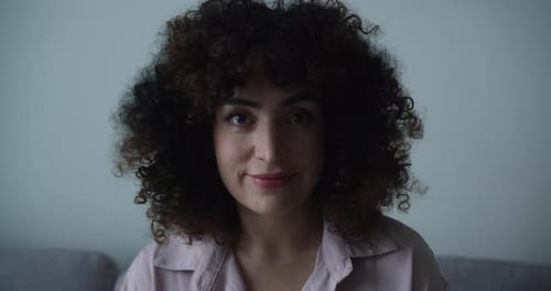 Face Brunet Curly Hair Woman Close Up Portrait of a Beautiful Young Woman with Curly Hair Looking at