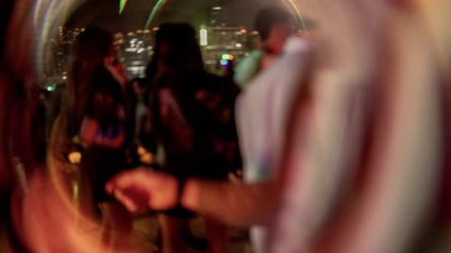 Blurred nightlife scene with party atmosphere in the city