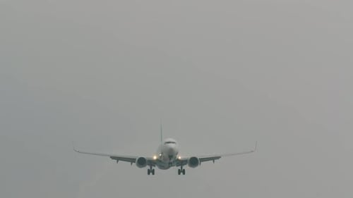Airplane Landing Foggy Sky