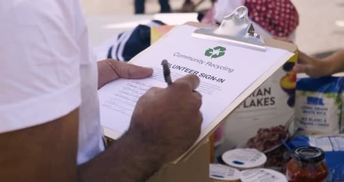 Volunteer Sign-in at Food Drive