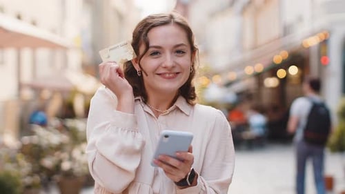 Young Woman Using Credit Bank Card Smartphone While Transferring Money Purchases Online Shopping