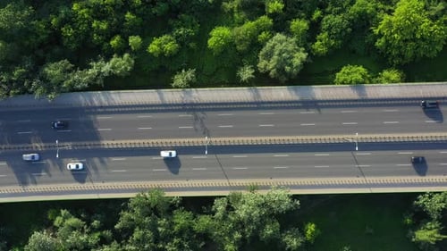 Aerial Drone Flight top down View of freeway busy city rush hour heavy traffic jam highway. Aerial v
