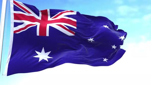 Realistic Australian Flag Waving Seamlessly Against Blue Sky